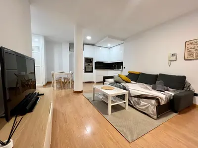 Una televisión o centro de entretenimiento en Sea lover Home
