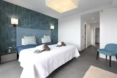 Cama o camas de una habitación en Salobre La Isla 7