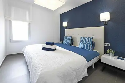 Cama o camas de una habitación en Salobre La Isla 7
