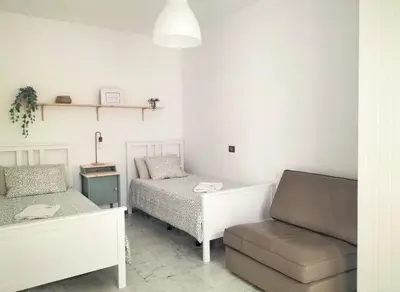 Cama o camas de una habitación en Vivienda Paralelo 28º