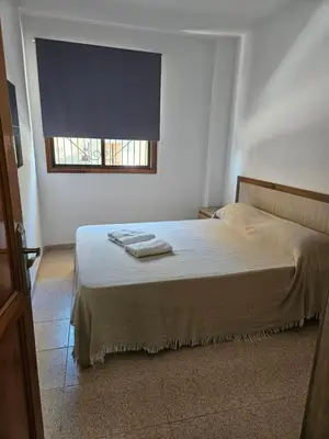 Cama o camas de una habitación en Apartamento gonzalez arinaga