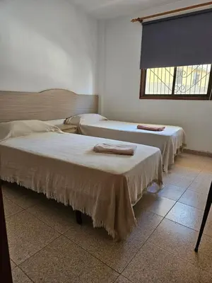 Cama o camas de una habitación en Apartamento gonzalez arinaga