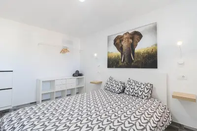 Cama o camas de una habitación en Blue sky, apartamento vista oceano