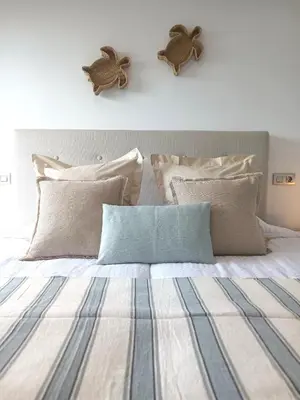 Cama o camas de una habitación en Las Burras Beachfront