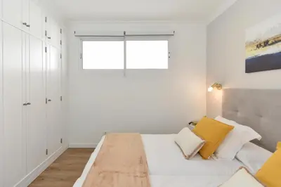 Cama o camas de una habitación en Maranuelas Beachfront 305 FP by VillaGranCanaria