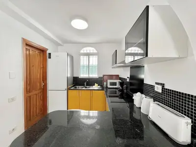 Una cocina o zona de cocina en Sunlight Place Bungalow