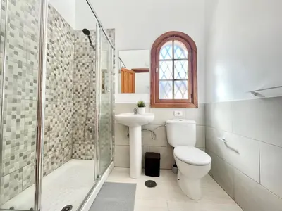 Un baño de Sunlight Place Bungalow