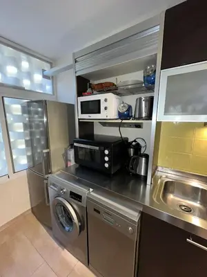Una cocina o zona de cocina en CERCA PLAYA - 6 PERSONAS - IDEAL FAMILIAS