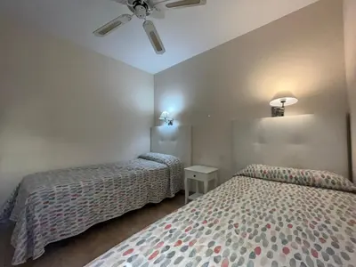 Cama o camas de una habitación en CERCA PLAYA - 6 PERSONAS - IDEAL FAMILIAS