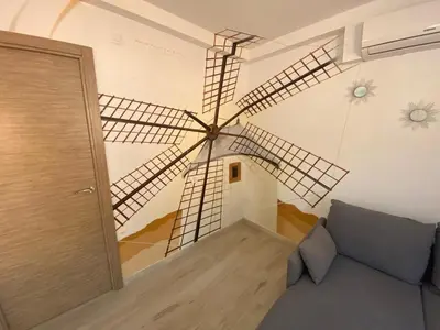Zona de estar de La Fortaleza House MOGAN
