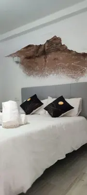 Cama o camas de una habitación en La Fortaleza House MOGAN