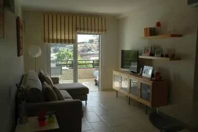 Una televisión o centro de entretenimiento en Alojamiento en el Paraiso