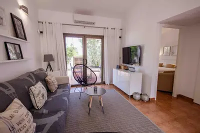 Una televisión o centro de entretenimiento en Deluxe Santa Barbara - by Gestión Vacacional Canarias