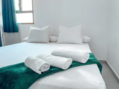 Cama o camas de una habitación en Fee4me Gáldar, Agaete Valley and Sardinas Beach