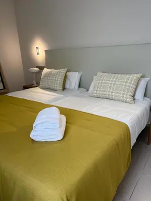 Cama o camas de una habitación en OMBÚLAFUENTE
