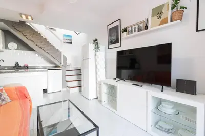 Una televisión o centro de entretenimiento en El patio, relax en Maspalomas