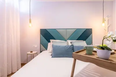 Cama o camas de una habitación en OASIS PLAYA DEL INGLES 324 by Homestaygrancanaria