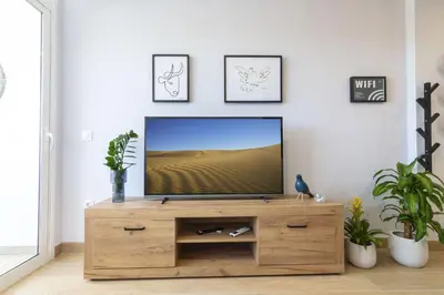 Una televisión o centro de entretenimiento en OASIS PLAYA DEL INGLES 324 by Homestaygrancanaria