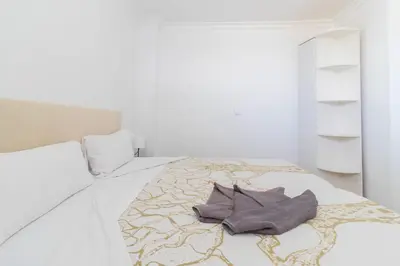 Cama o camas de una habitación en Sunny Vacations Gran Canaria