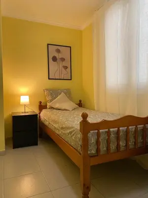 Cama o camas de una habitación en Luis Morote 2-A Apartamentos