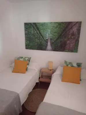 Cama o camas de una habitación en Casa en la playa, Aldea Coast
