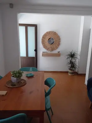 Zona de estar de Casa en la playa, Aldea Coast