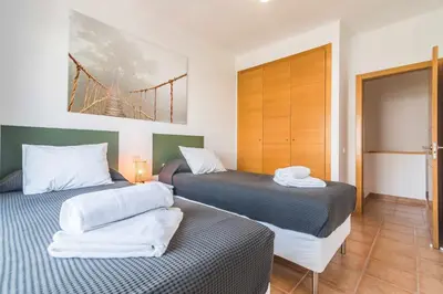 Cama o camas de una habitación en Residencial Las Candelarias 35