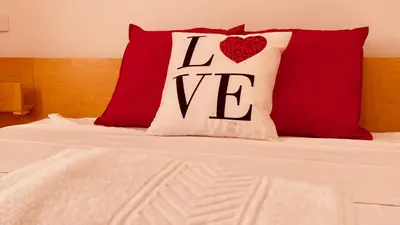 Cama o camas de una habitación en Casa de Las Flores
