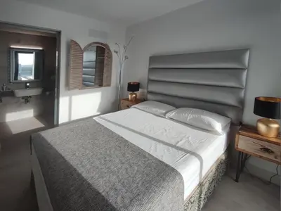 Cama o camas de una habitación en VillasRoyale Diamante - A Diamond to Discover!