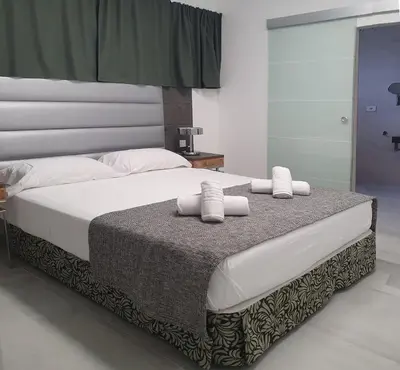 Cama o camas de una habitación en VillasRoyale Diamante - A Diamond to Discover!