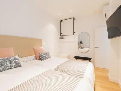 Cama o camas de una habitación en MG CANTERAS SUITES