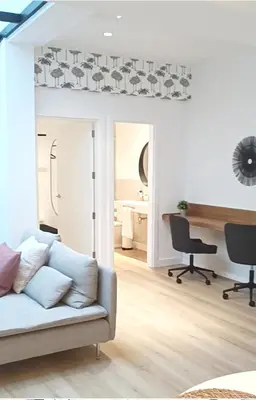 Zona de estar de MG CANTERAS SUITES