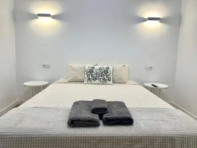 Cama o camas de una habitación en Apartamento Savaya Suite