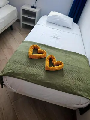Cama o camas de una habitación en Paraíso Para Todos