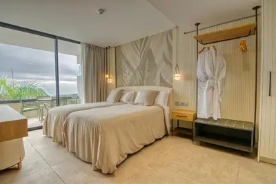 Cama o camas de una habitación en RELAXIA BEVERLY SUITES