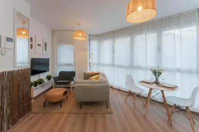 Una televisión o centro de entretenimiento en Sand View Canteras by Canarias Homelidays