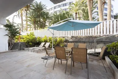 Un patio o zona al aire libre en Oasis Playa Maspalomas