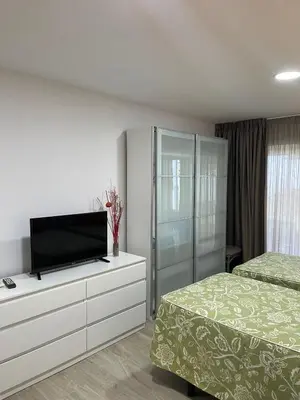 Cama o camas de una habitación en Oasis Playa Maspalomas