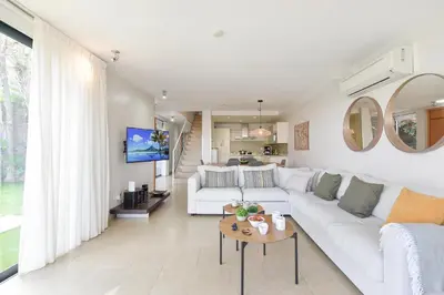Zona de estar de Villa Sol 13 by VillaGranCanaria