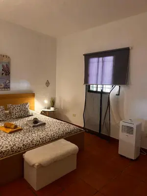 Cama o camas de una habitación en Bed&Ride La Manigua