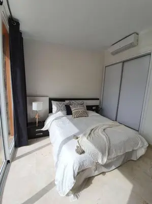 Cama o camas de una habitación en Ocean Apartment Tauro, Fast WI-FI, Pool, Terrace