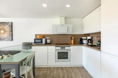 Una cocina o zona de cocina en Playa del Ingles - Paraiso
