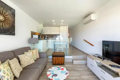 Una televisión o centro de entretenimiento en Playa del Ingles - Paraiso