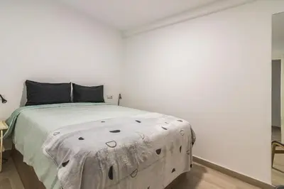 Cama o camas de una habitación en Home2Book Design Apartment Maspalomas Paraíso