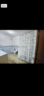 Un baño de V.V. familiar