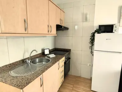 Una cocina o zona de cocina en Magic Conch Holiday Home