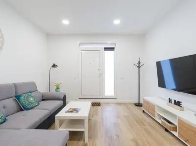 Una televisión o centro de entretenimiento en Urban Surf Beach By CanariasGetaway