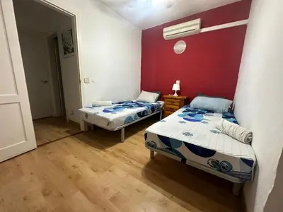 Cama o camas de una habitación en La casita de Ángela