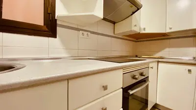 Una cocina o zona de cocina en Click&Guest - Las Canteras Rose