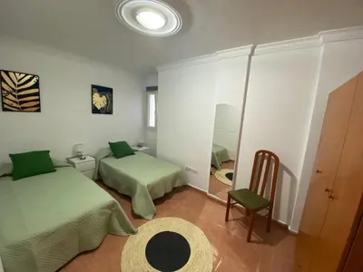 Cama o camas de una habitación en Apartamento en costa de Telde